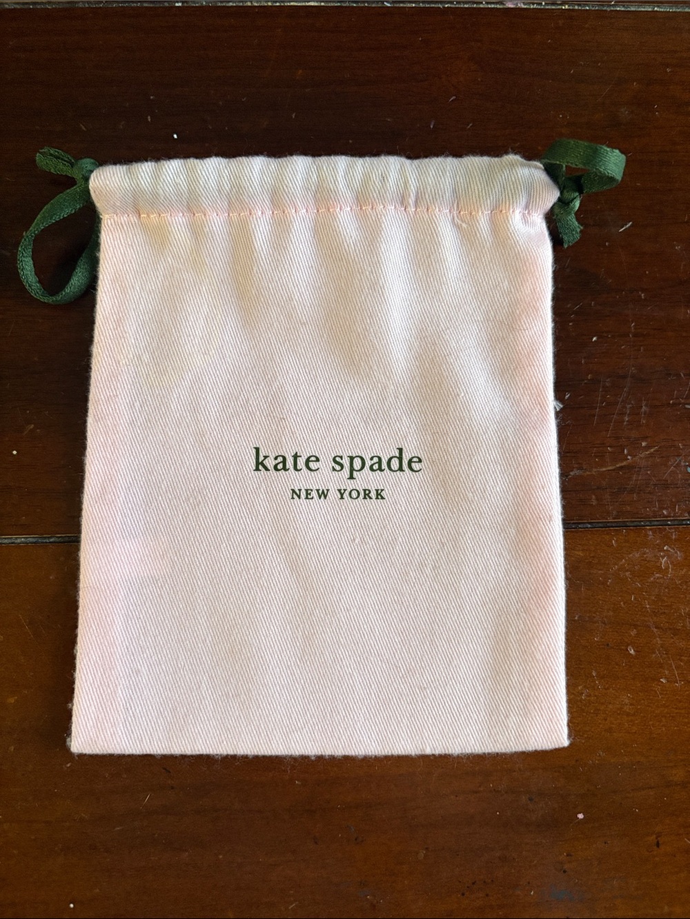kate spade pink small wallet drawstring dustbag with green logo